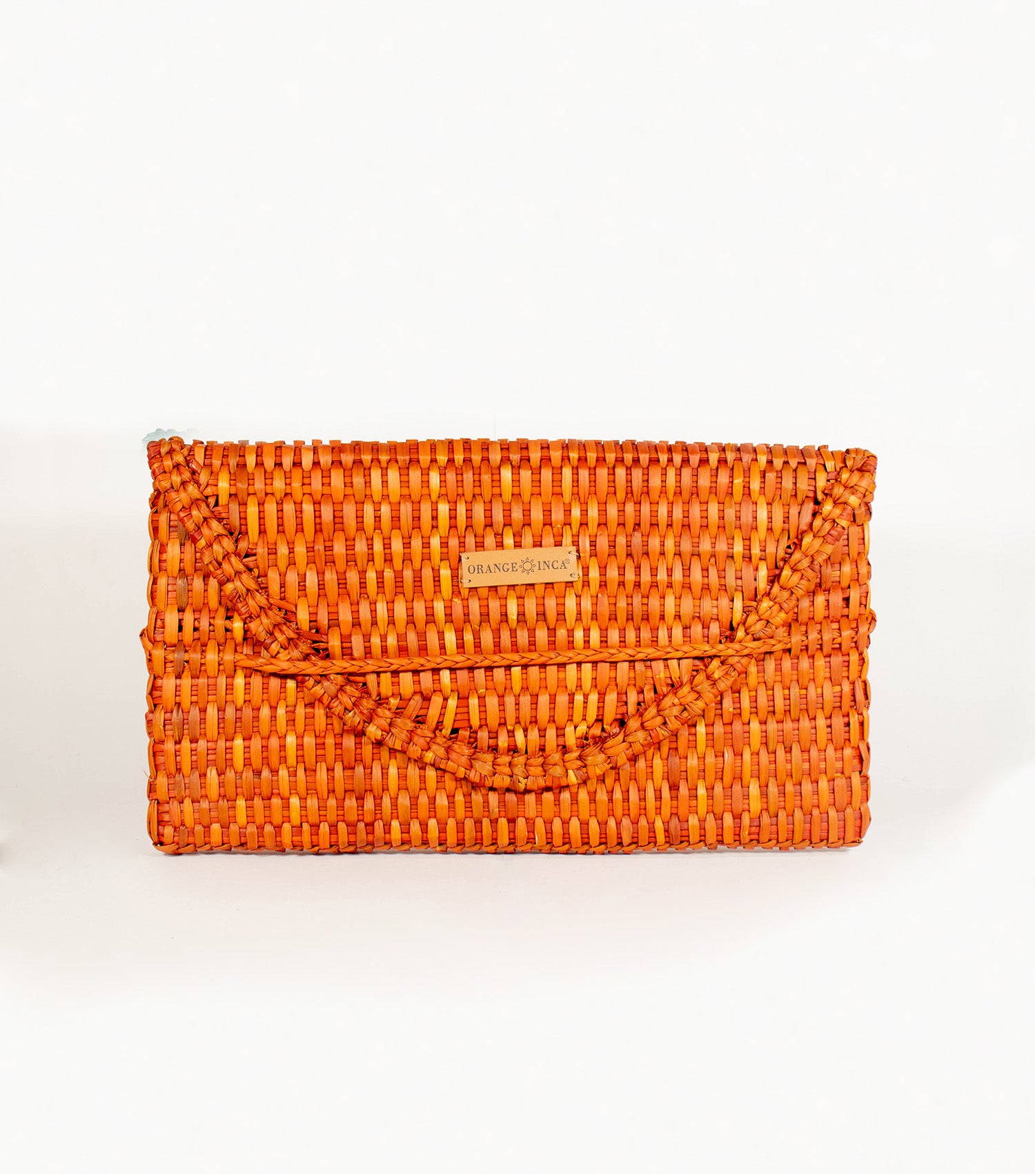 Lima Clutch front view - radiant Terracotta highlighted by its sleek design and the distinct Orange Inca emblem on vegetable leather.