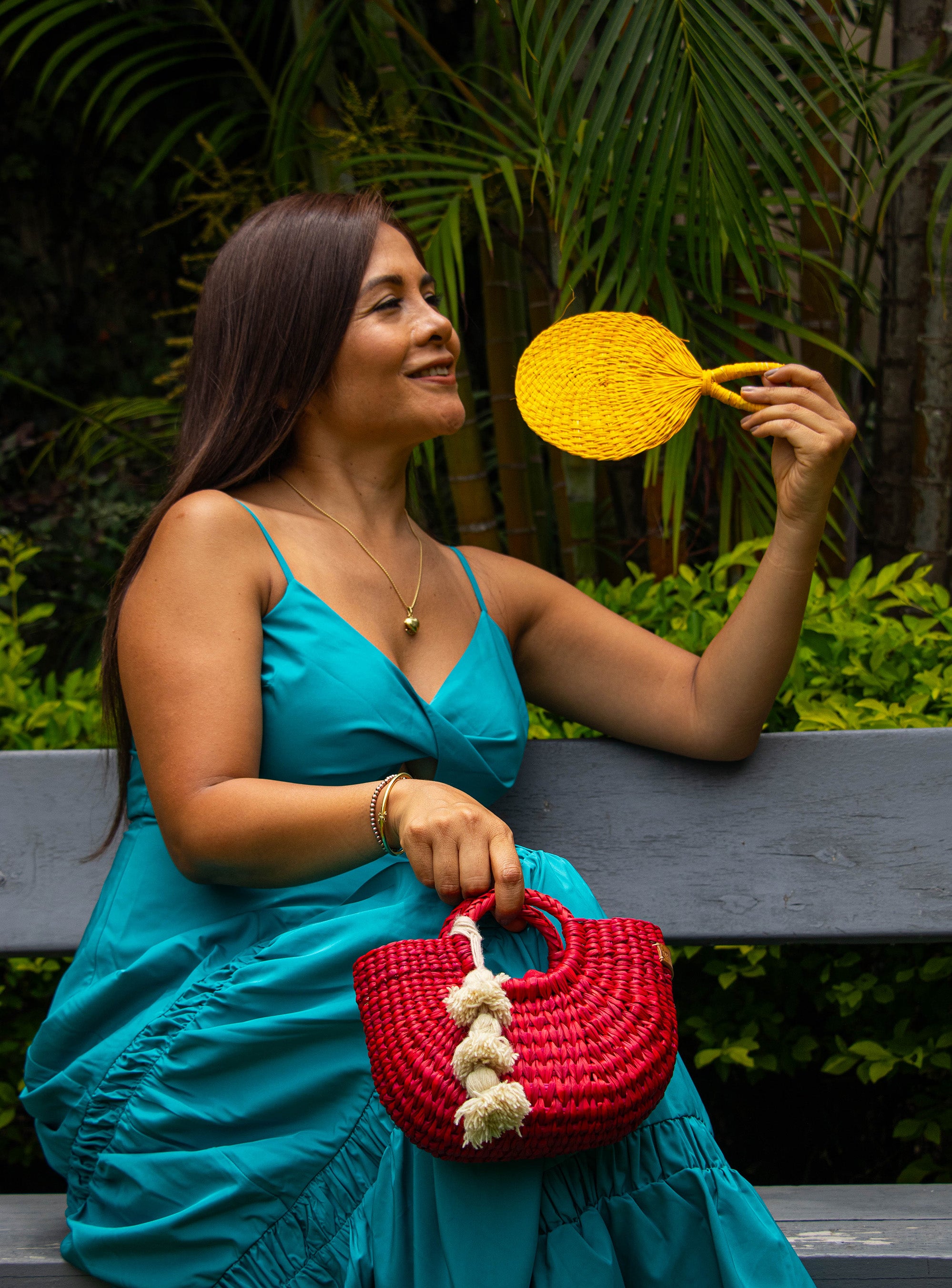Fiesta Mini in Red, and the cutest hand fan in Yellow. All handmade from Junco in Peru.