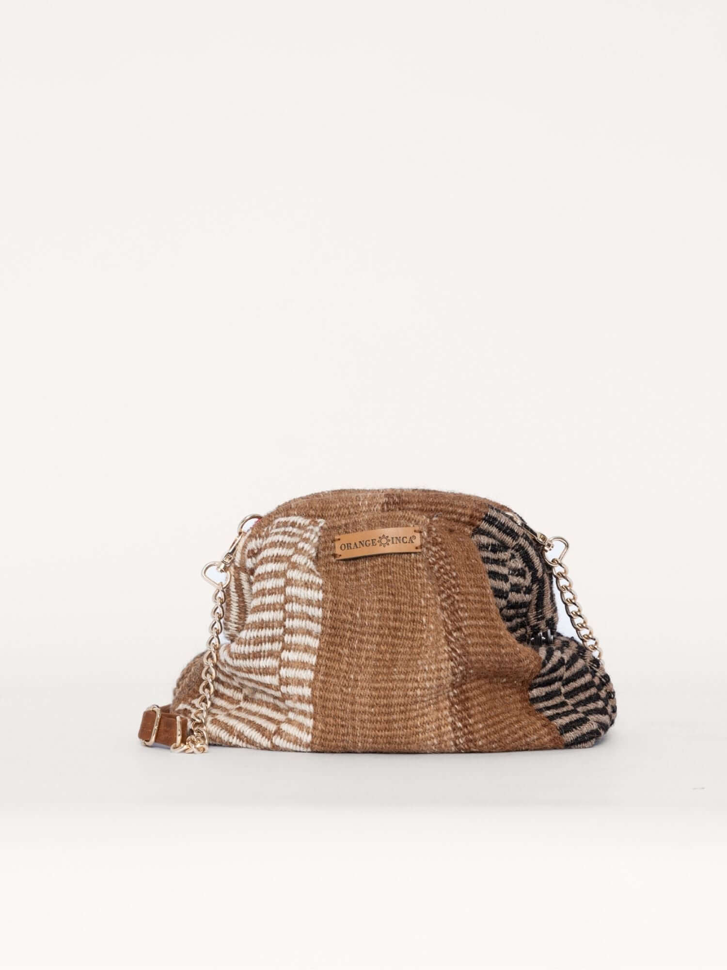 Front view of kiss lock clutch bag in 100% alpaca wool – structured artisan evening purse with gold frame