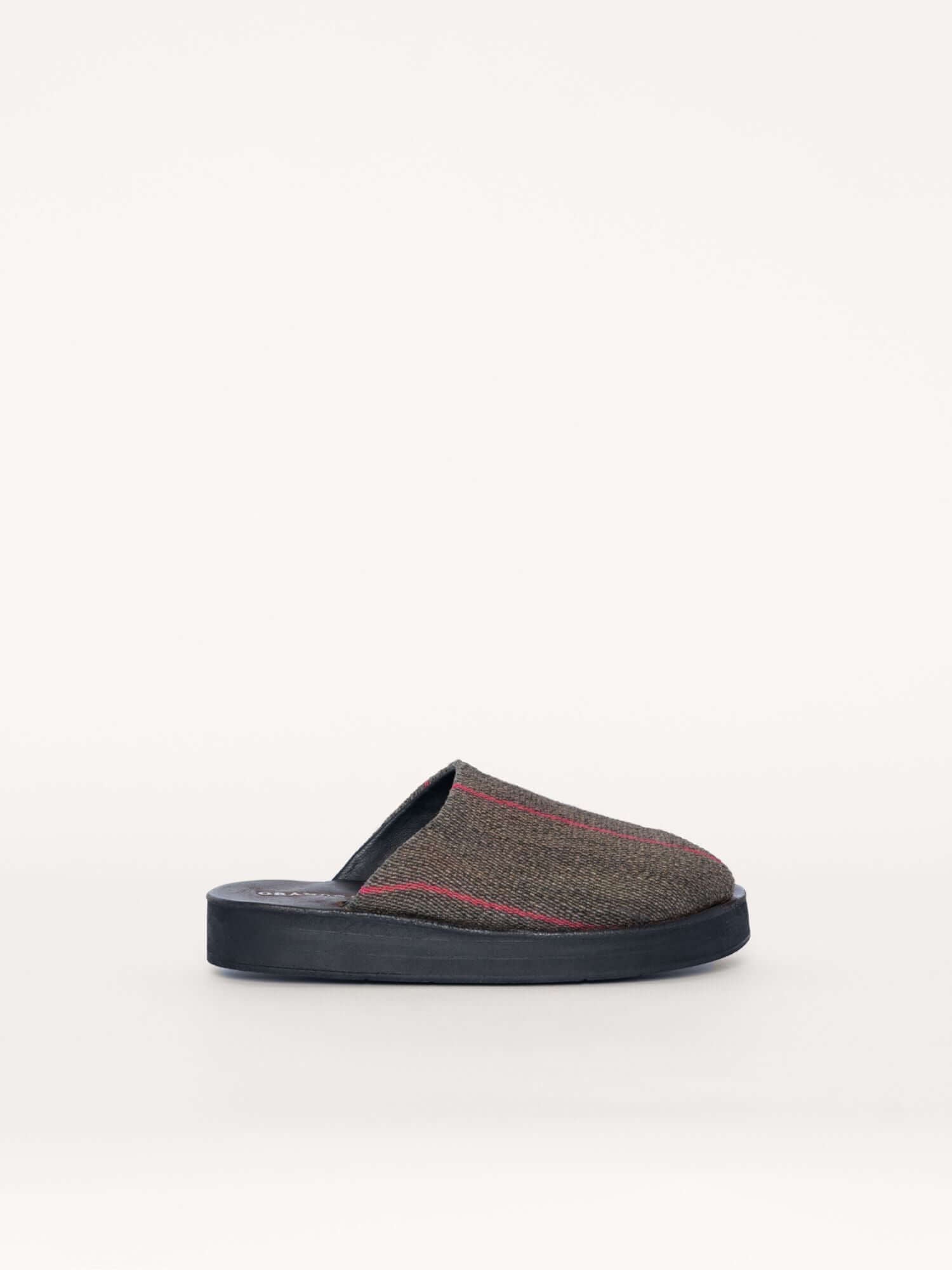 Green and gray wool clogs with fuchsia stripe accents, side view.