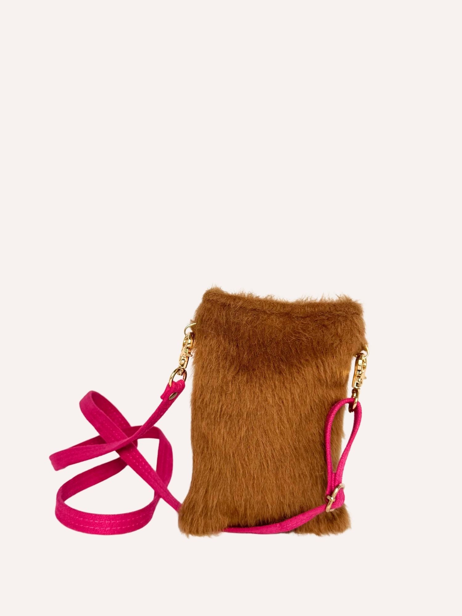 Alpaca fur mini crossbody bag in fuchsia with adjustable leather strap