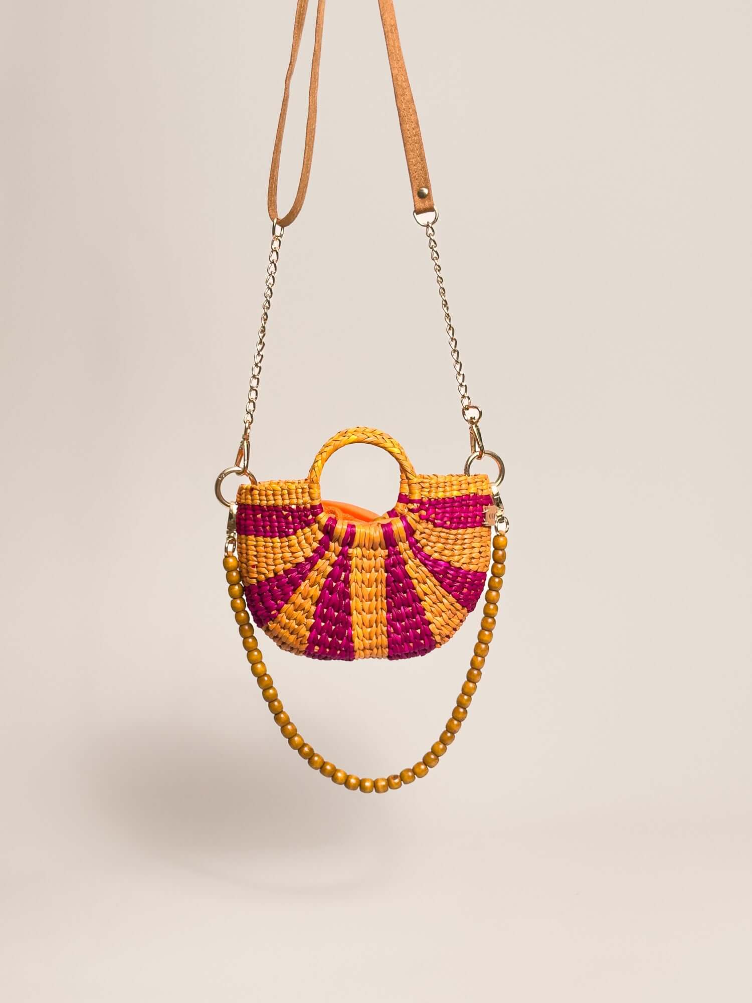 Handwoven straw crossbody bag w removable straps | Striped Fuchsia and Orange 