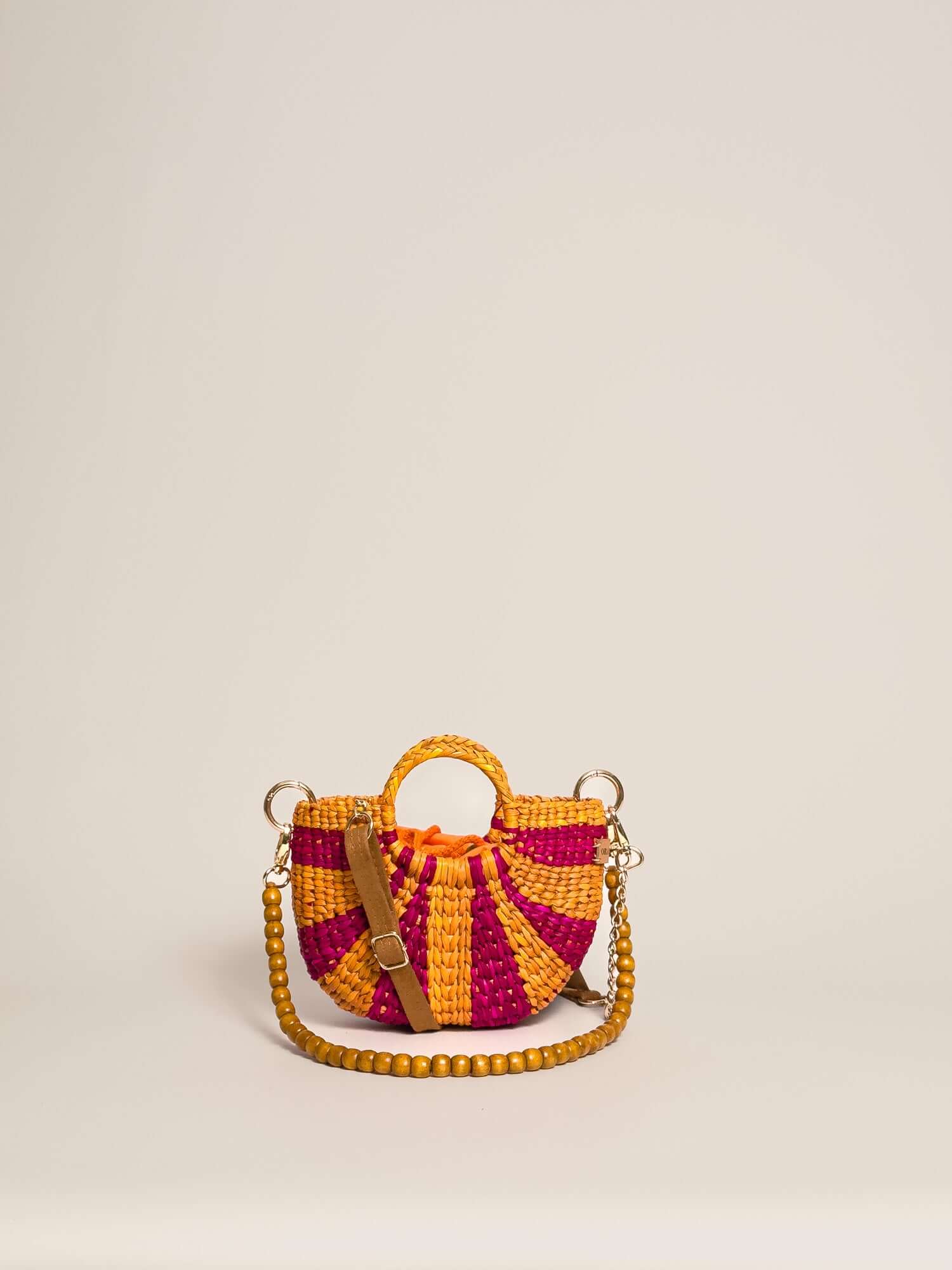 Designer straw crossbody bag by Orange Inca - summer mini purse | Striped Fuchsia and Orange 