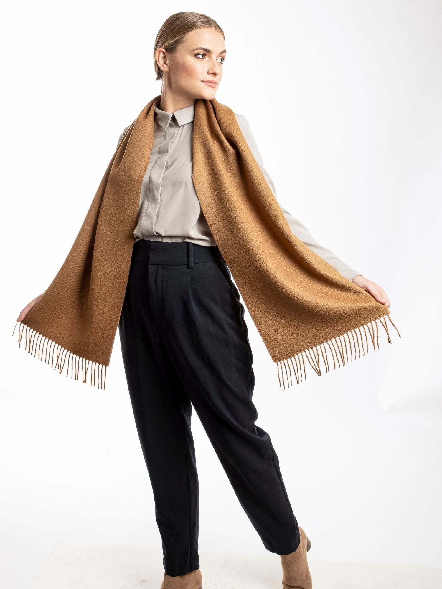 Full-length view of premium baby alpaca scarf in camel brown - luxury softer than cashmere