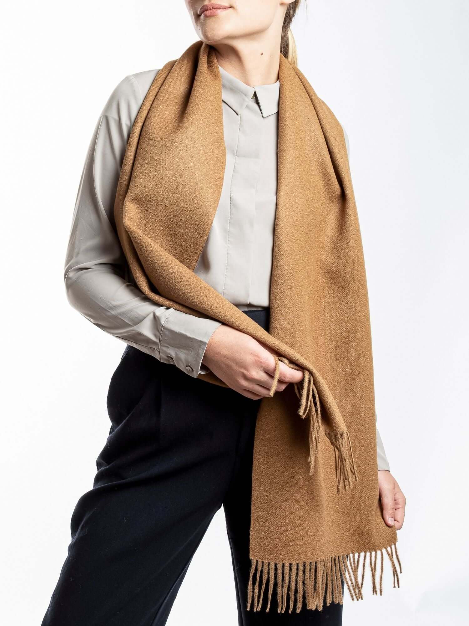 Premium baby alpaca wool scarf in camel brown - luxury sustainable winter accessory