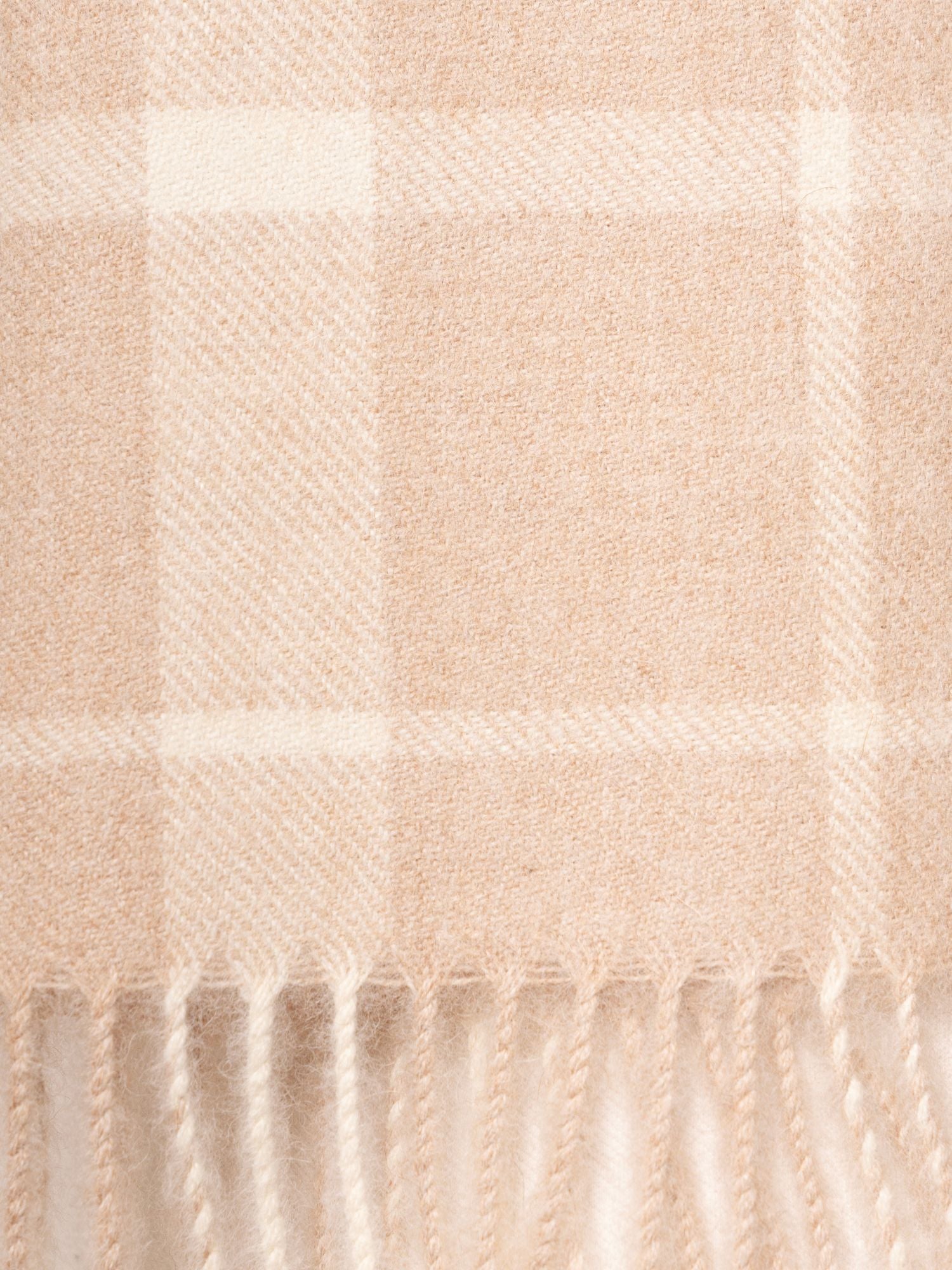 Close up of baby alpaca scarf in plaid beige and white for men and women 