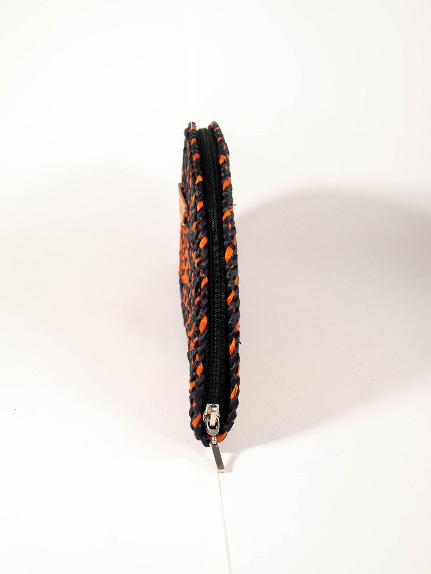 Detail of handwoven natural reed weave, Flamenco Clutch – Black & Orange | Orange Inca