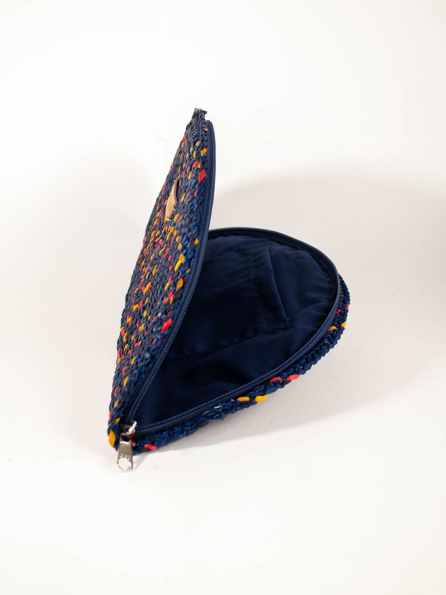 Flamenco Clutch – Navy Blue showing fan silhouette and zip closure | Orange Inca