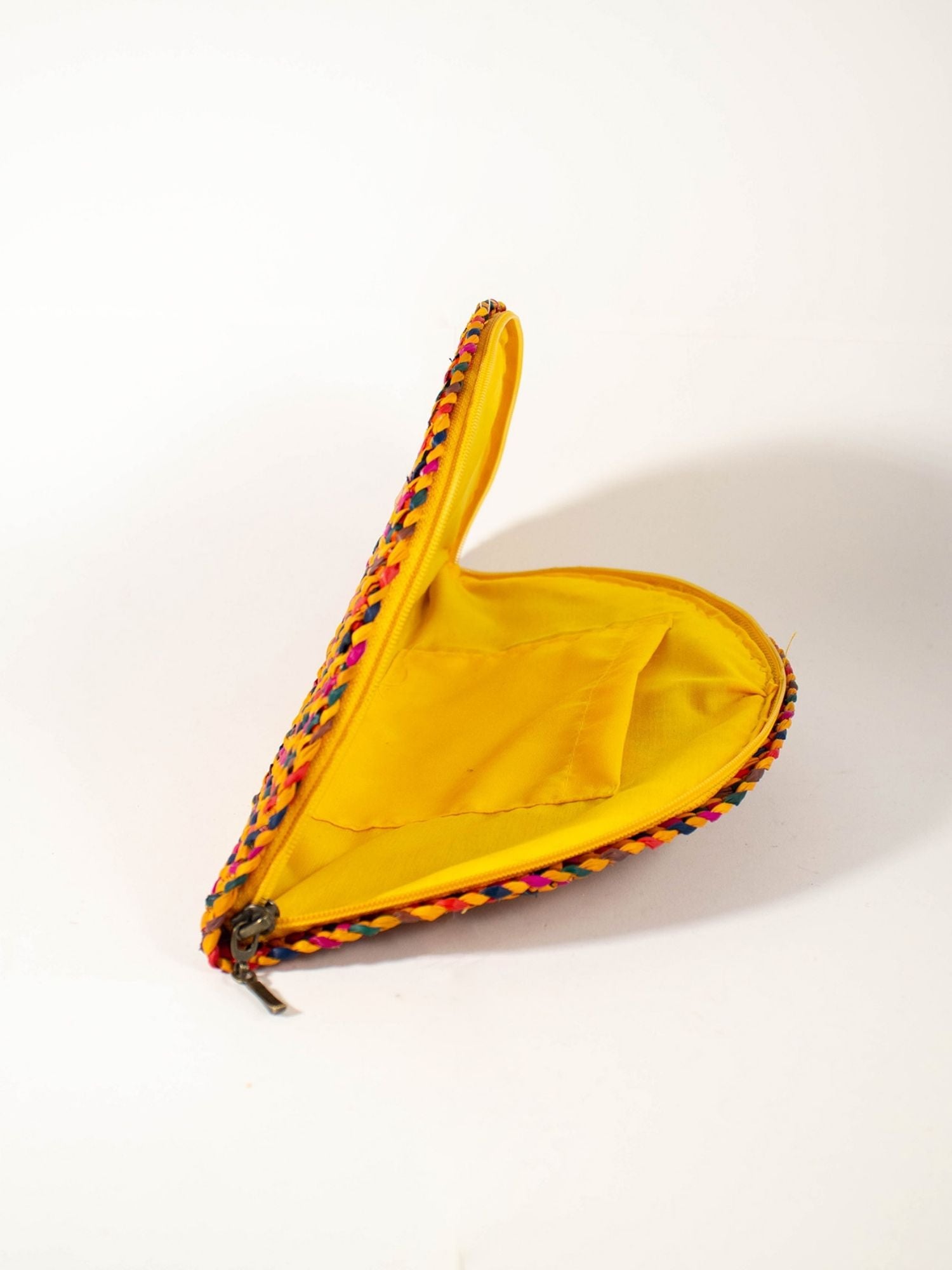 Flamenco Clutch – Yellow Carnival showing fan silhouette and zip closure | Orange Inca