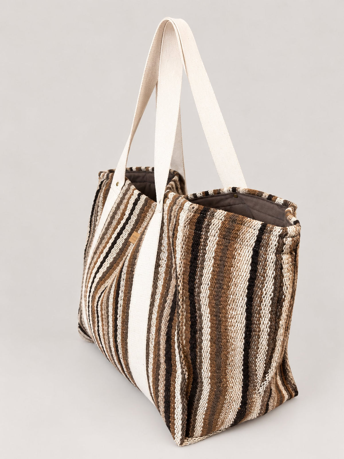 The Manta Carryall in Brown and Cream Stripes — side view