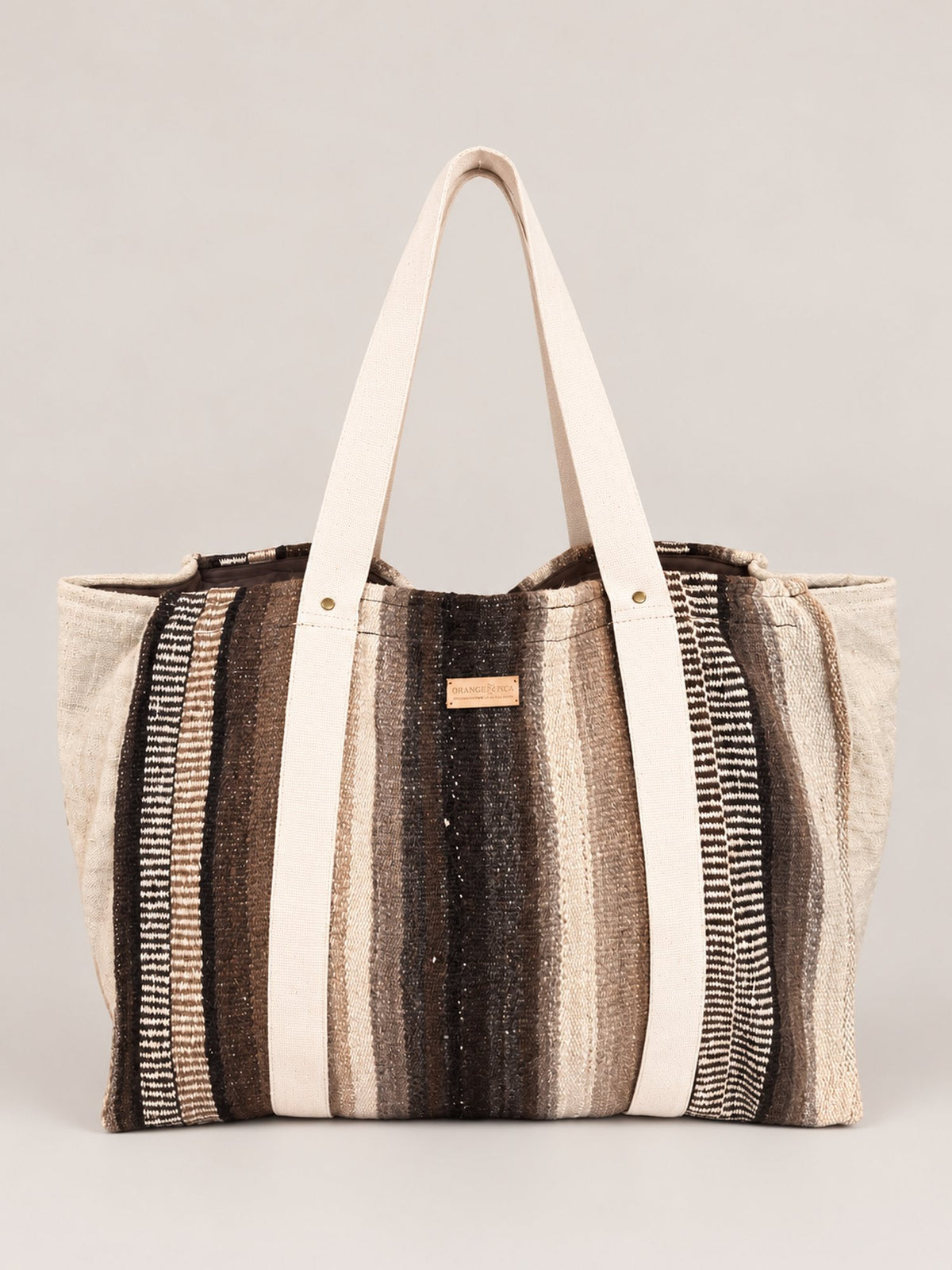 The Manta Carryall in Dark Browns and Ivory — front view