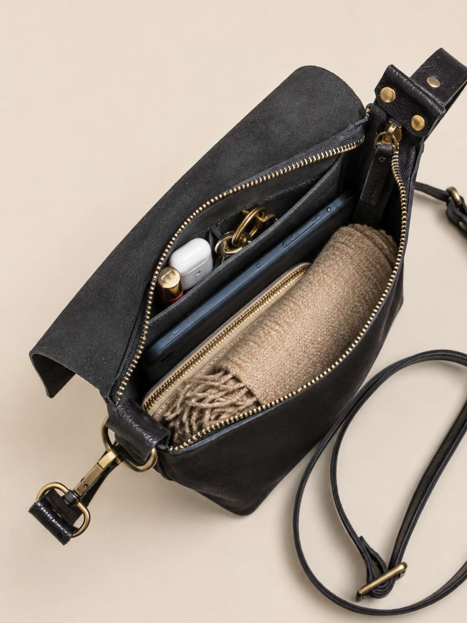 Black Olivia interior — unlined leather inside and out, zip closure | Orange Inca