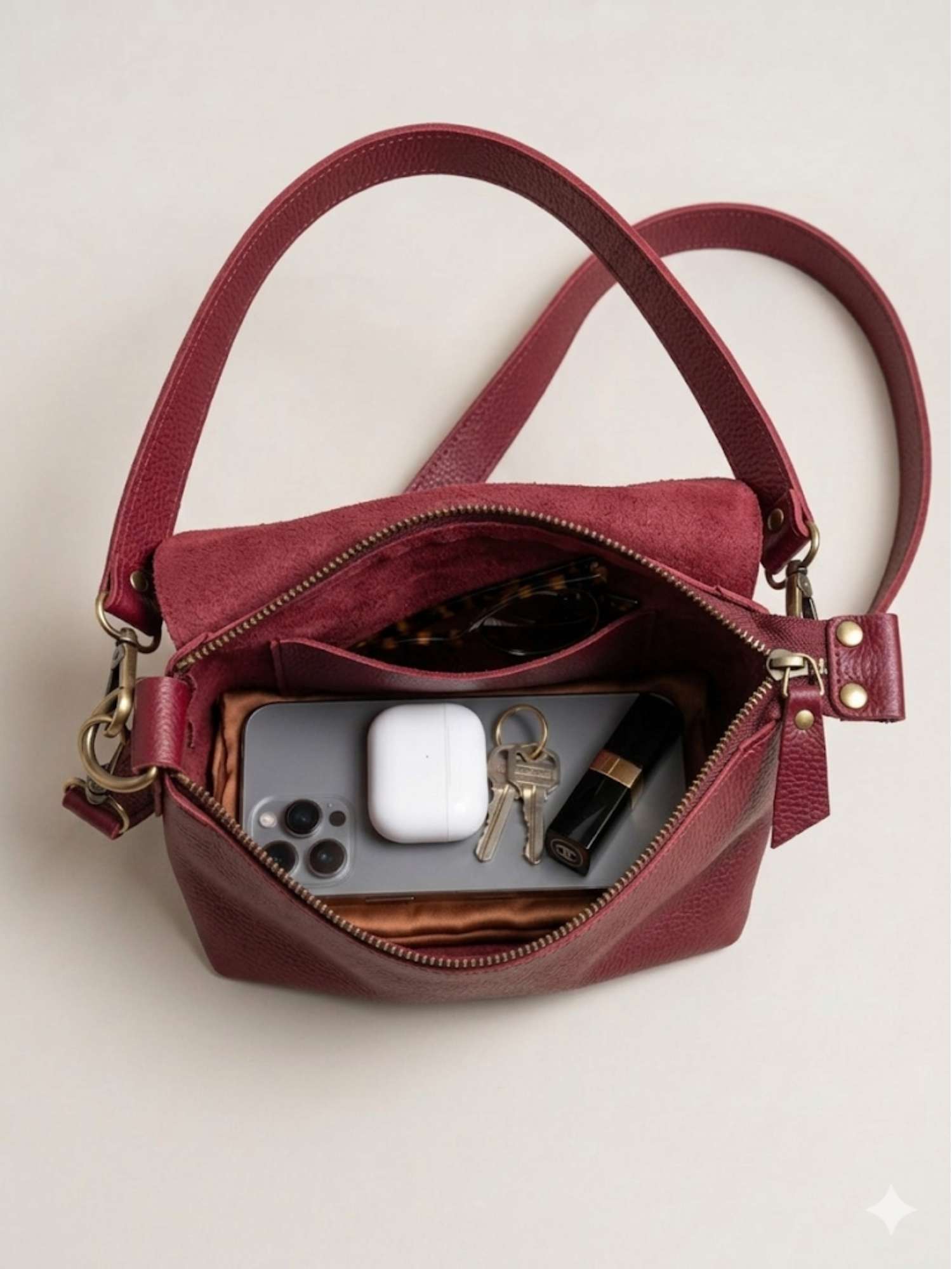Burgundy Olivia interior — unlined leather inside and out, zip closure | Orange Inca