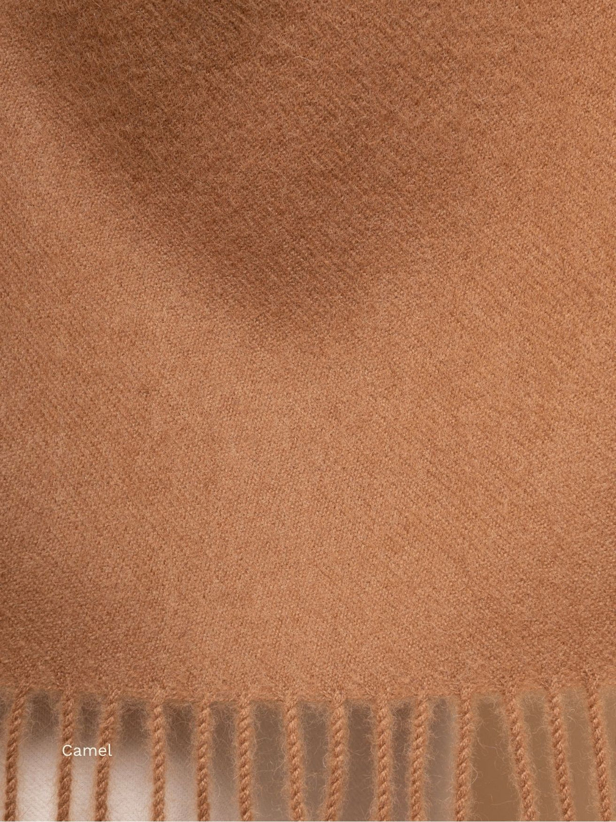 Close-up of a camel undyed baby alpaca scarf with fringe, soft brushed Peruvian alpaca fibre