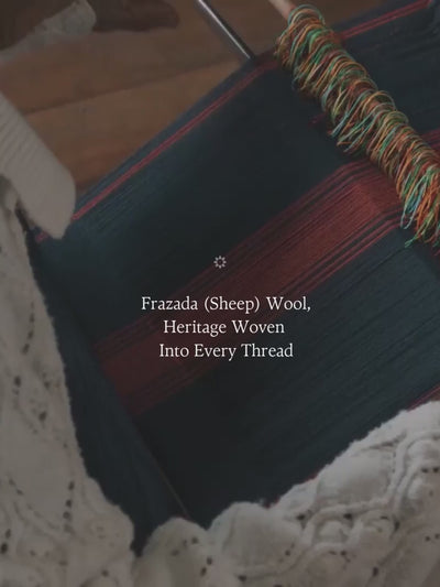 Video of Peruvian artisan weaving brightly coloured frazada wool textiles on a traditional loom.